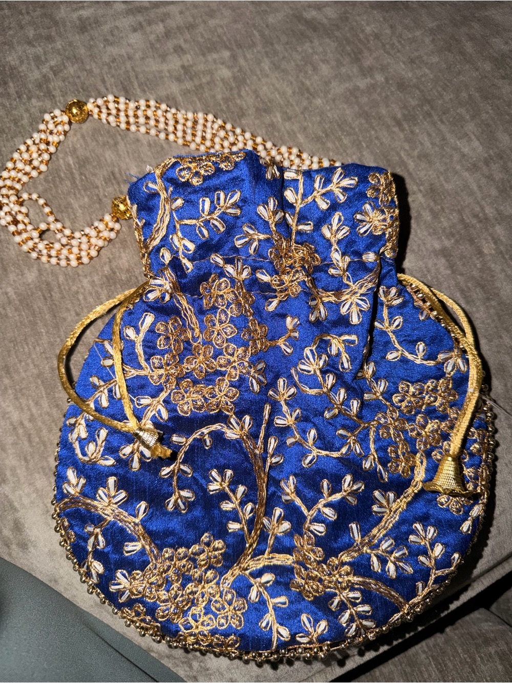 Handcrafted Blue Embroidered Potli Bag with Gold Detailing